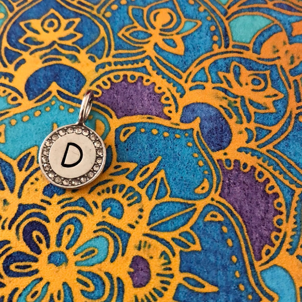 Tresors charm D